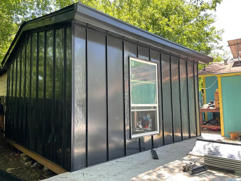 Black standing seam metal wall panels for Metal Roof Installation in Tanglewilde