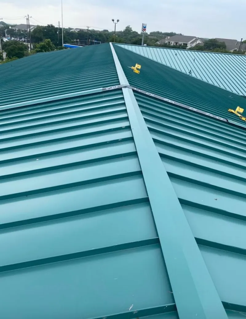 Green commercial metal roof ridge and valley for Metal Roof Repair in Tanglewilde